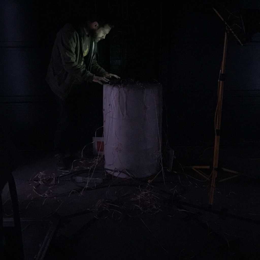 Making art in an abandoned car wash. Photo by Alicia Yip. Making art in an abandoned car wash. Photo by Alicia Yip.